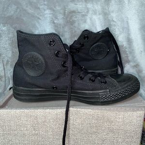 Women’s all black high top Converse